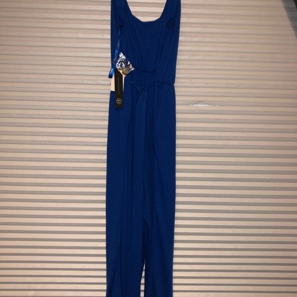 Never been worn, brand new jumpsuit, still has price tag on - Picture 3 of 5